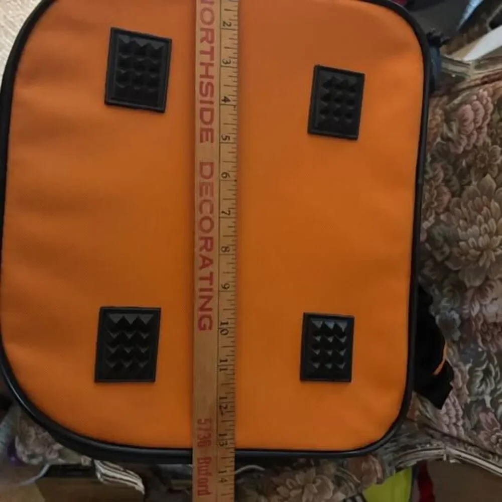 Orange and black soft-sided pet carrier, about 18x12x9 inches
